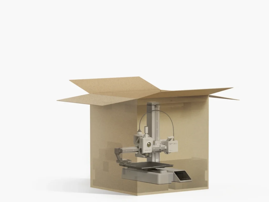 Bambu Lab A1 mini в открытой картонной коробке: принтер приходит собранным, рендер производителя